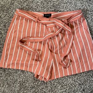Pink and white striped paper bag shorts